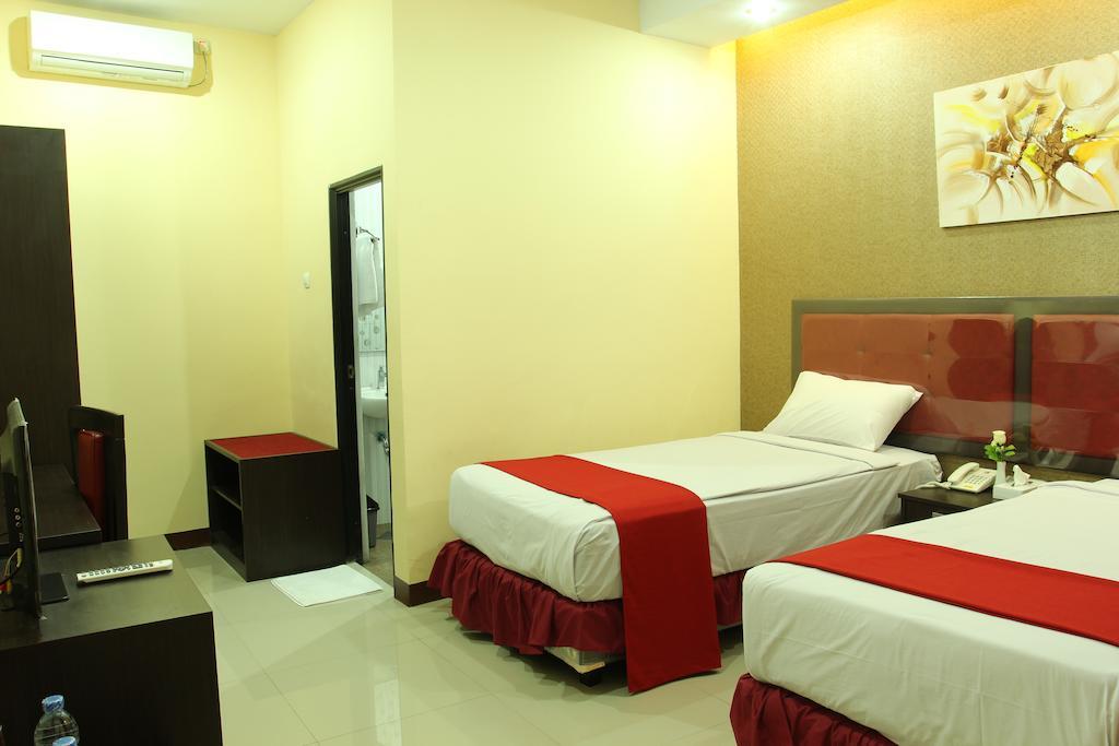Gumilang Hotel Богор Номер фото